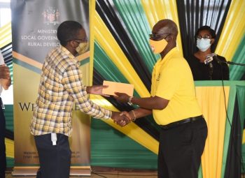 Port Maria Small Business Operators Get Flood Relief Cheques